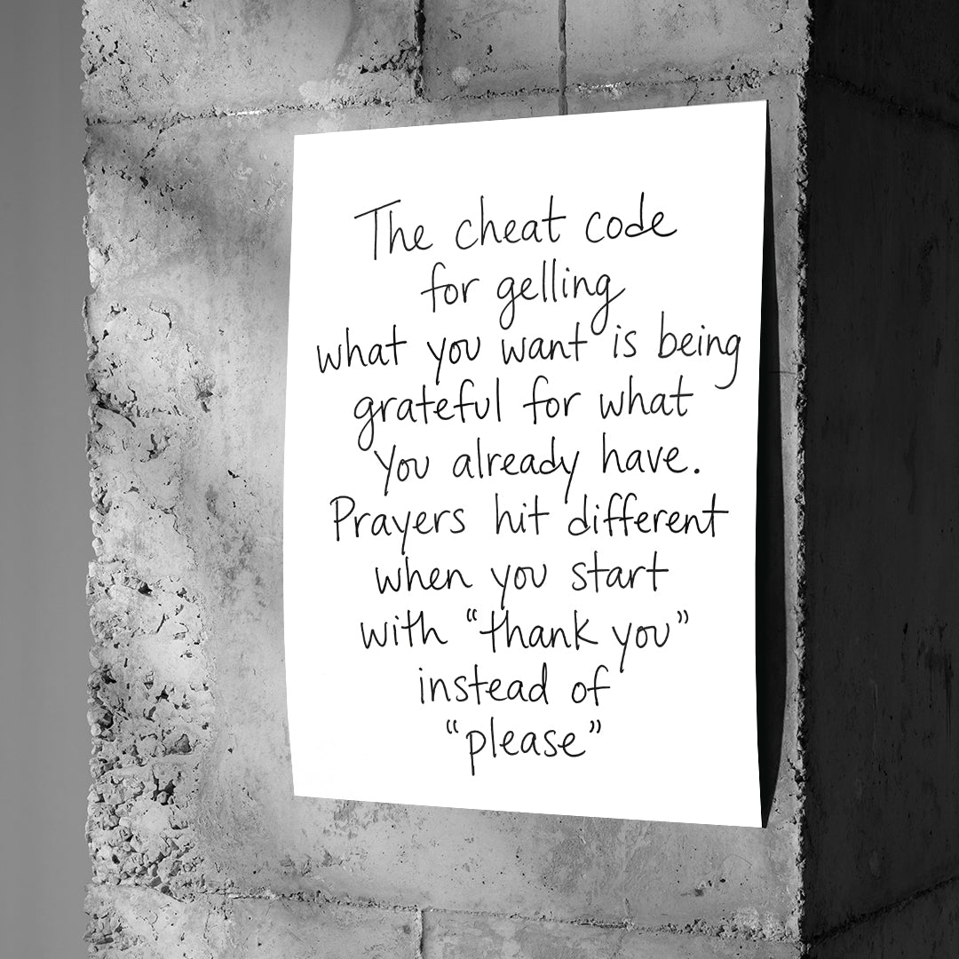 DOTCOMCANVAS Cheat Code Poster an Betonwand